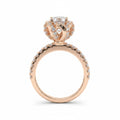 Jade18k Rose gold 18k ring with cubic zirconia stones and a detailed crown-like setting.
