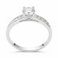 Jade18k April engagement ring in sterling silver with a central round-cut cubic zirconia and pave-set stones on the band.