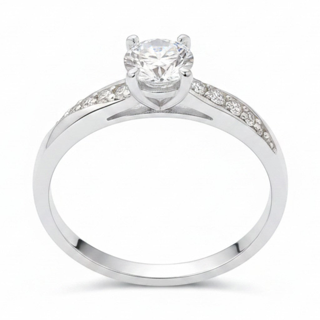 Jade18k April engagement ring in sterling silver with a central round-cut cubic zirconia and pave-set stones on the band.