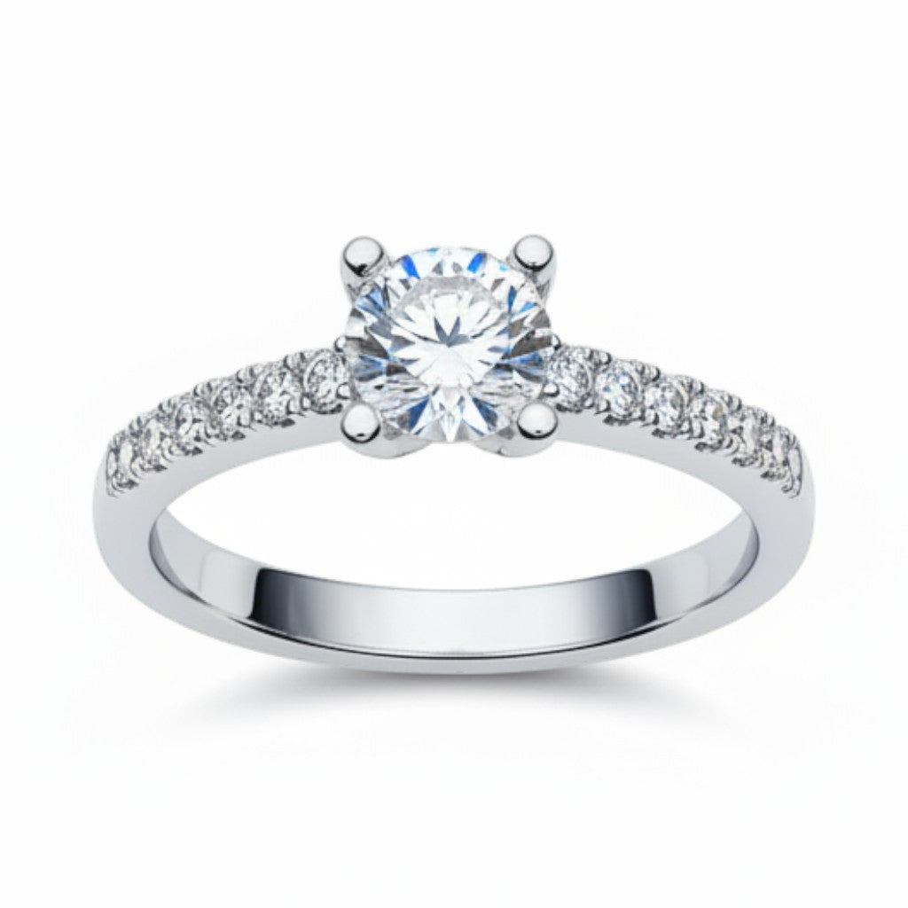 Jade18k Rafaella engagement ring in silver with a central round-cut diamond and smaller stones along the band.