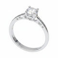Jade18k sterling silver solitaire ring with a clear cubic zirconia and heart cutouts on the band.