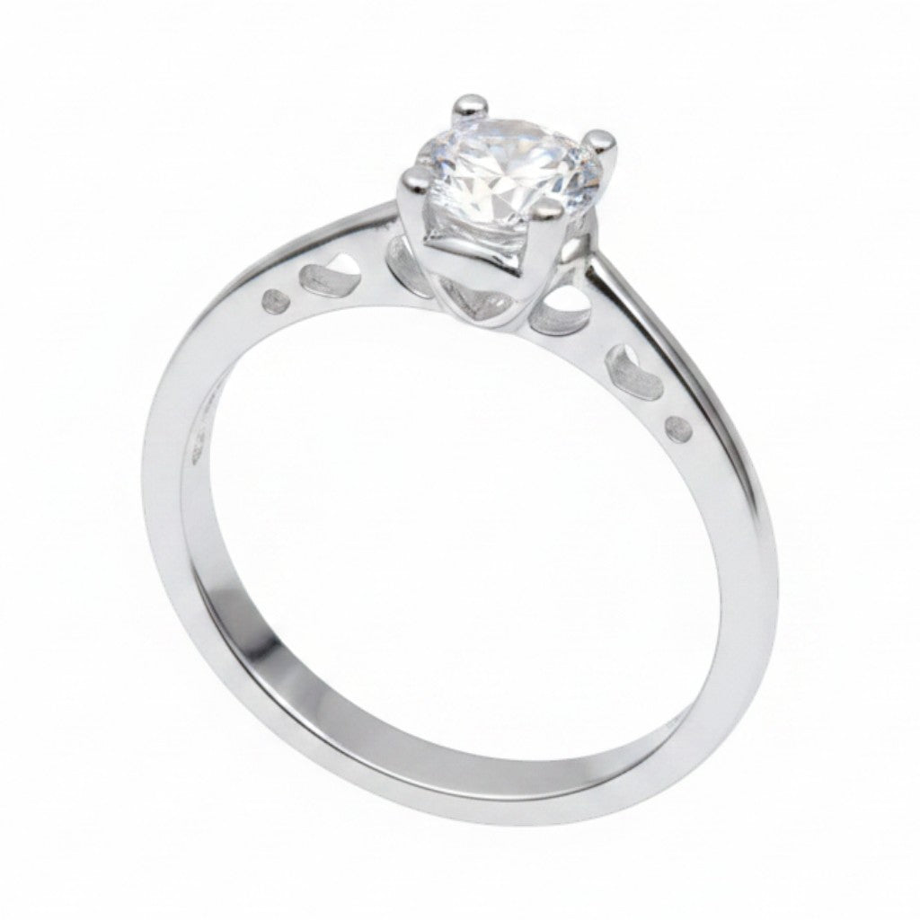 Jade18k sterling silver solitaire ring with a clear cubic zirconia and heart cutouts on the band.