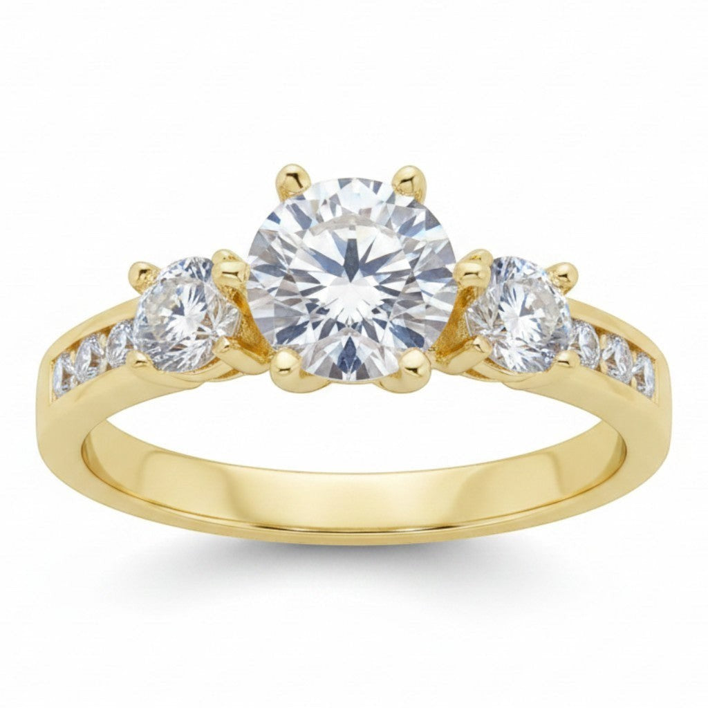 Jade18k yellow gold three-stone engagement ring with round-cut center stone and channel-set accent stones.