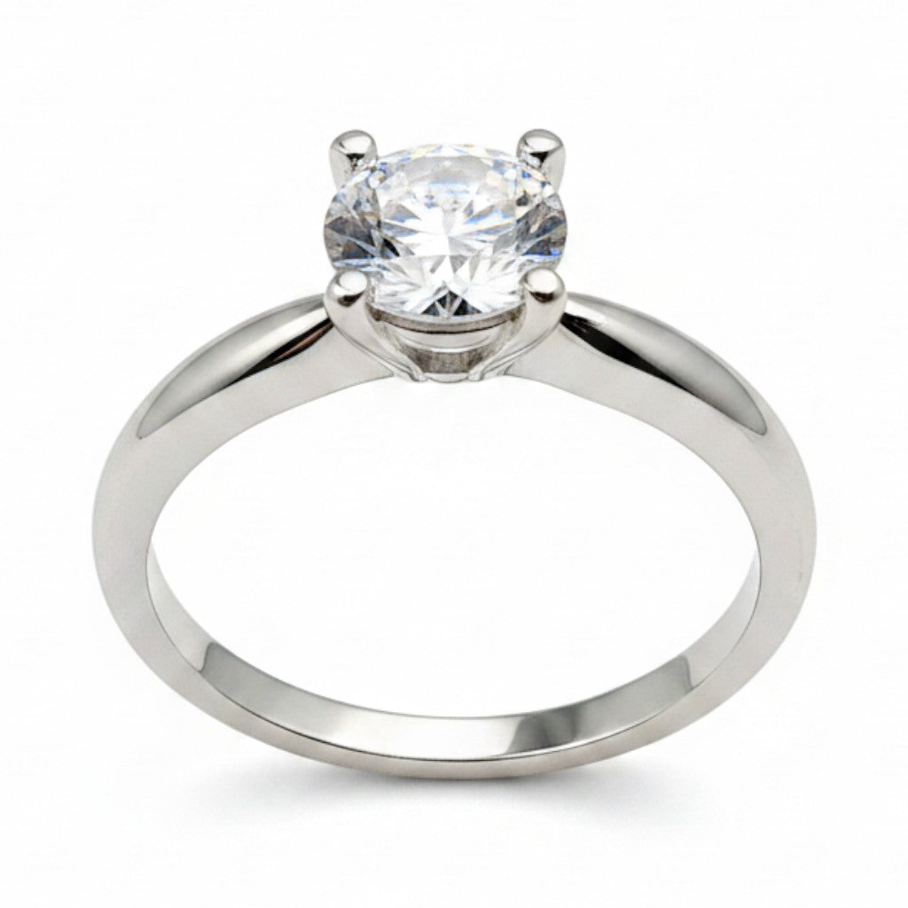 Jade18k solitaire engagement ring in 18k white gold with a round brilliant cut diamond.
