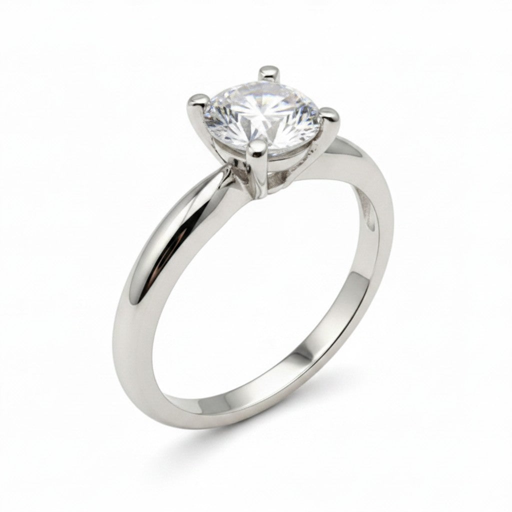 Jade18k solitaire engagement ring in 18k white gold with a round brilliant-cut diamond.