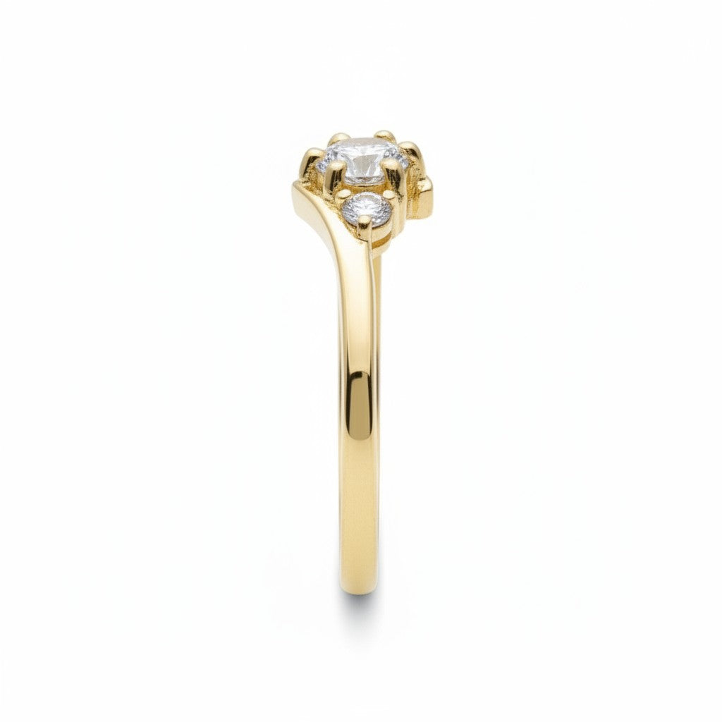 Jade18k 18k yellow gold engagement ring with a central lab-grown diamond and two smaller side diamonds.