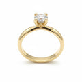 Jade18k Aurora engagement ring in 18k yellow gold with a lab-grown diamond and moissanite side stones.