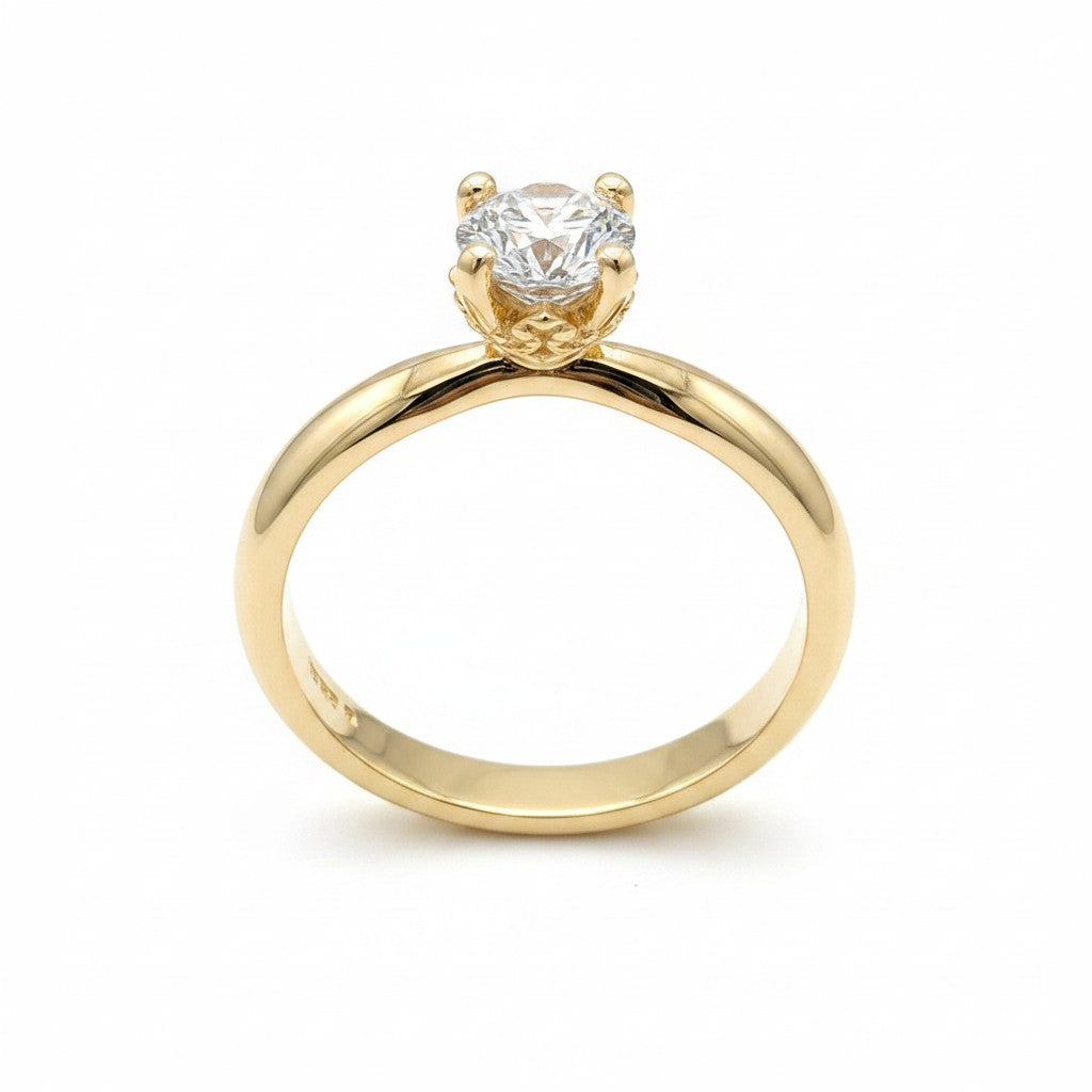 Jade18k Aurora engagement ring in 18k yellow gold with a lab-grown diamond and moissanite side stones.