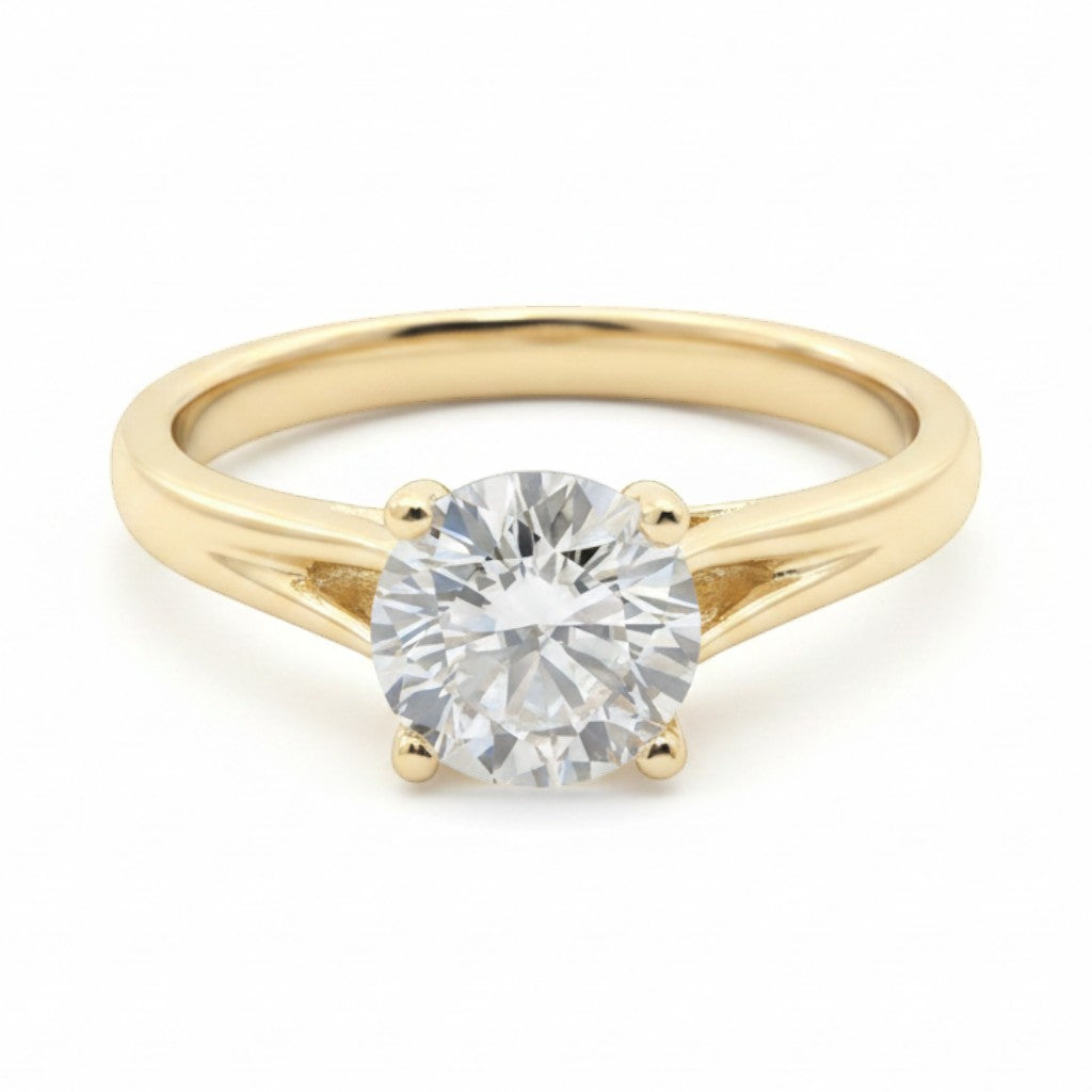 Jade18k 18k yellow gold solitaire ring with a round-cut diamond, approx. 4 grams.