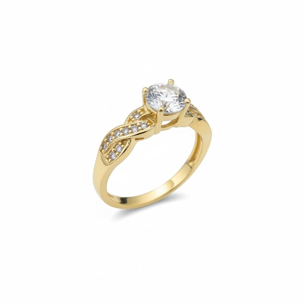 Jade18k 18k yellow gold engagement ring with a single central diamond and pave diamond band.