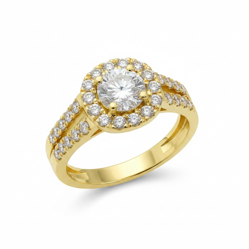 Jade18k Raquel engagement ring in 18k yellow gold with a central round-cut zircon surrounded by a halo of smaller stones.