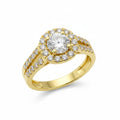 Jade18k Raquel engagement ring in 18k yellow gold with a central round-cut zircon surrounded by a halo of smaller stones.