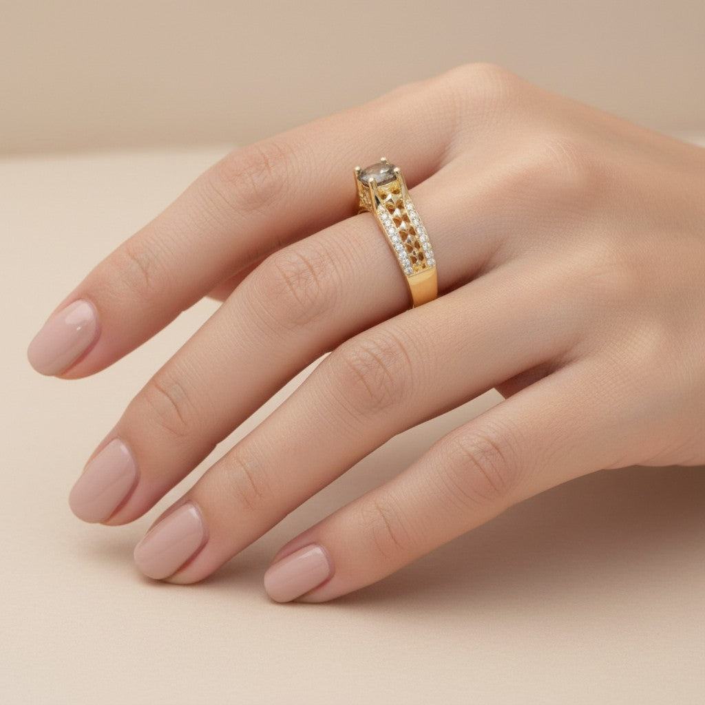 Jade18k Mariel engagement ring in 18k yellow gold with a central grey zircon and pavé set white stones on the band.