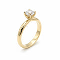 Jade18k Aurora engagement ring in 18k yellow gold with a lab-grown diamond and moissanite side stones.