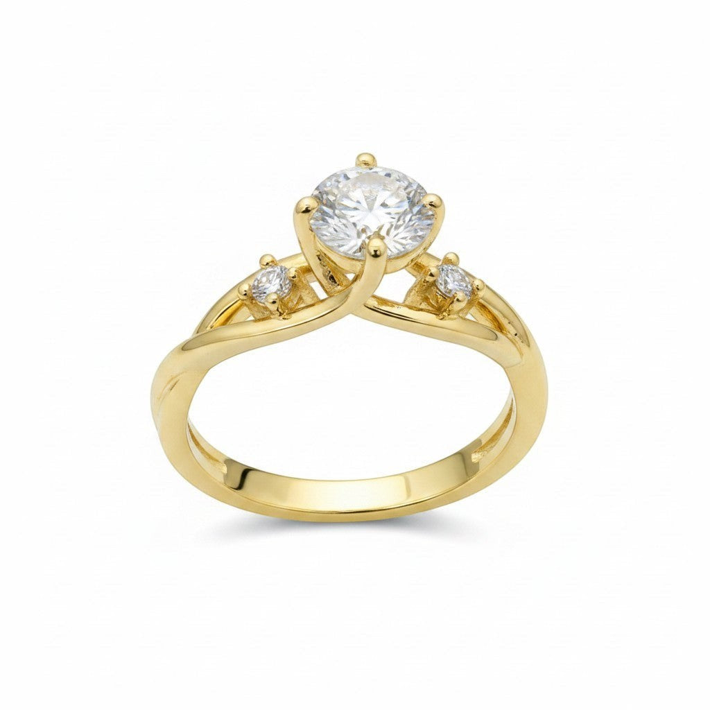 Jade18k yellow gold engagement ring with a central moissanite and two smaller stones on a twisted band.