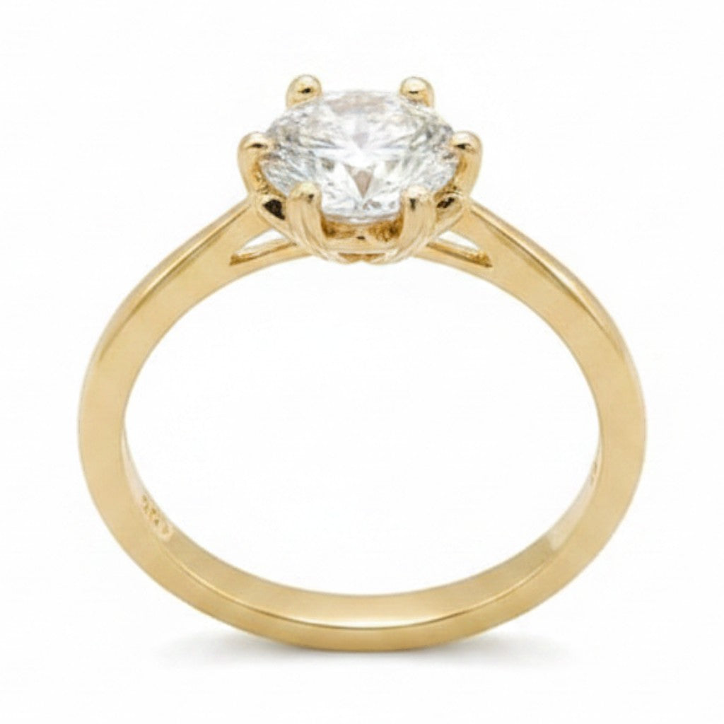 Jade18k yellow gold engagement ring with a round moissanite center stone, six-prong setting.