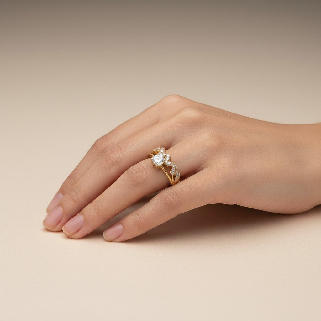 Jade18k 18k yellow gold engagement ring with a central moissanite and smaller stones along the band.