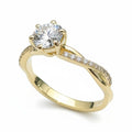 Jade18k 18k yellow gold engagement ring with a large moissanite center stone and a twisted band with small diamonds.