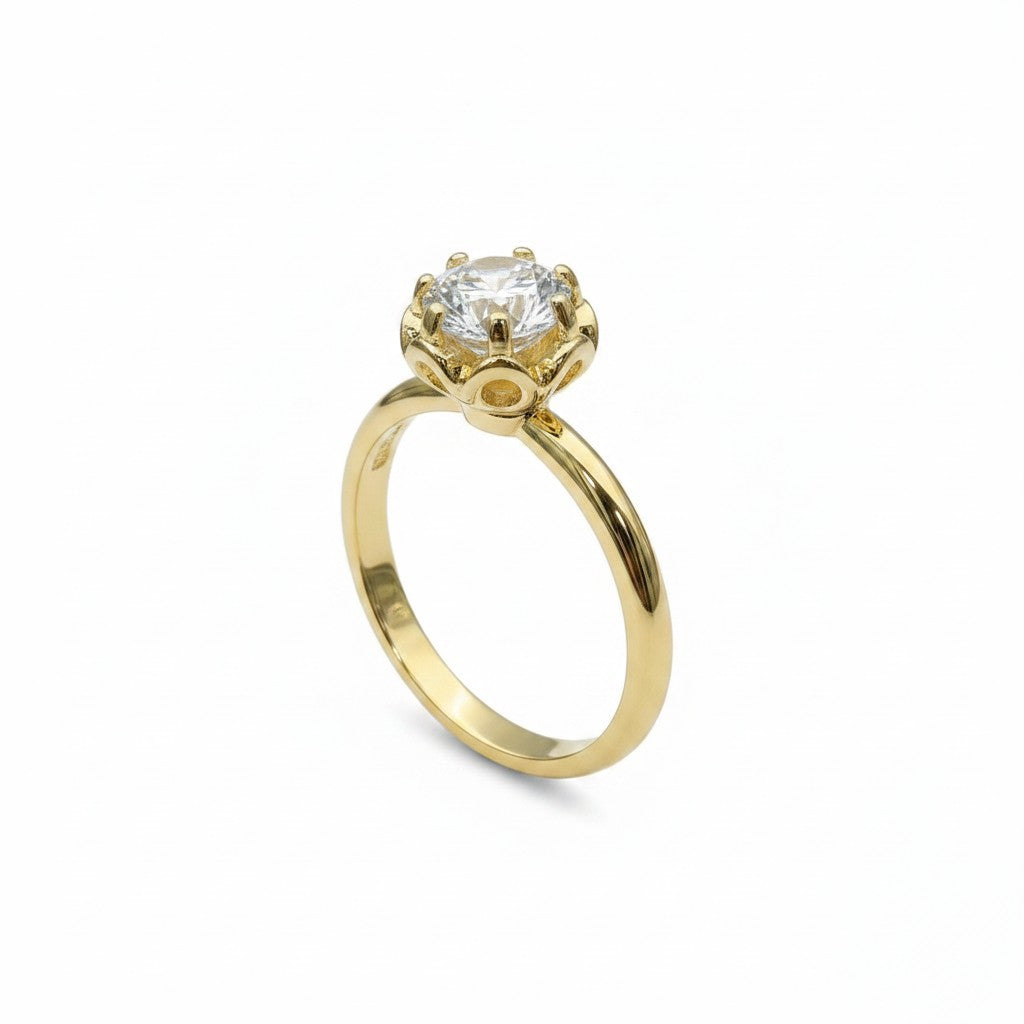 Jade18k 18k yellow gold engagement ring with a round moissanite stone set in a floral-inspired crown.