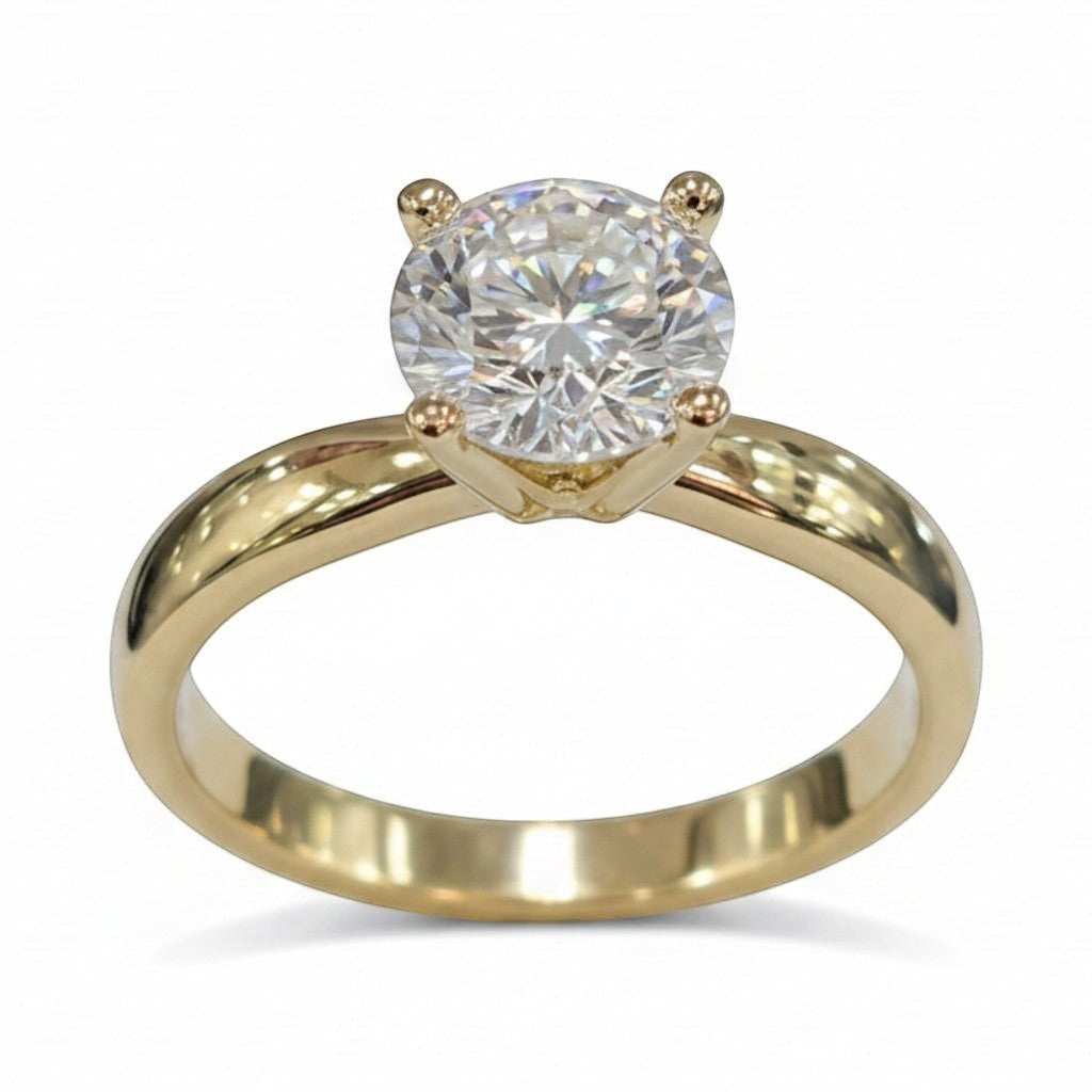 Jade18k 18k yellow gold ring with a brilliant cut moissanite center stone, 5.37 grams.