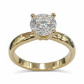 Jade18k 18k yellow gold ring with a brilliant cut moissanite center stone, 5.37 grams.