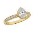 Jade18k 18k yellow gold engagement ring with oval-cut cubic zirconia and pavé diamond band.