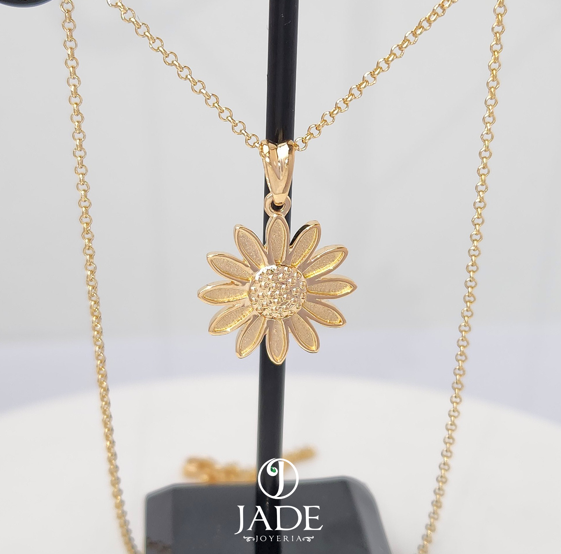 Dije de girasol