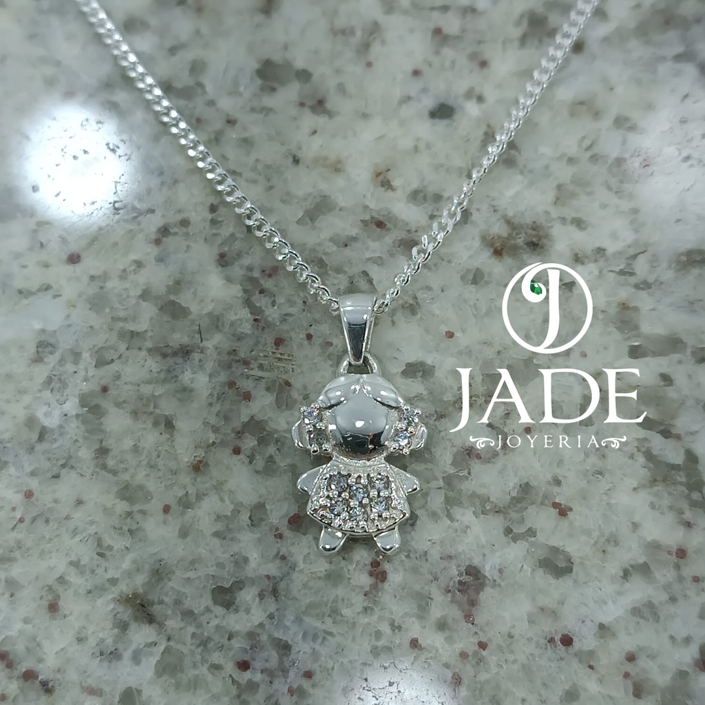 Dije de niña pequeña con moñitos en plata ley