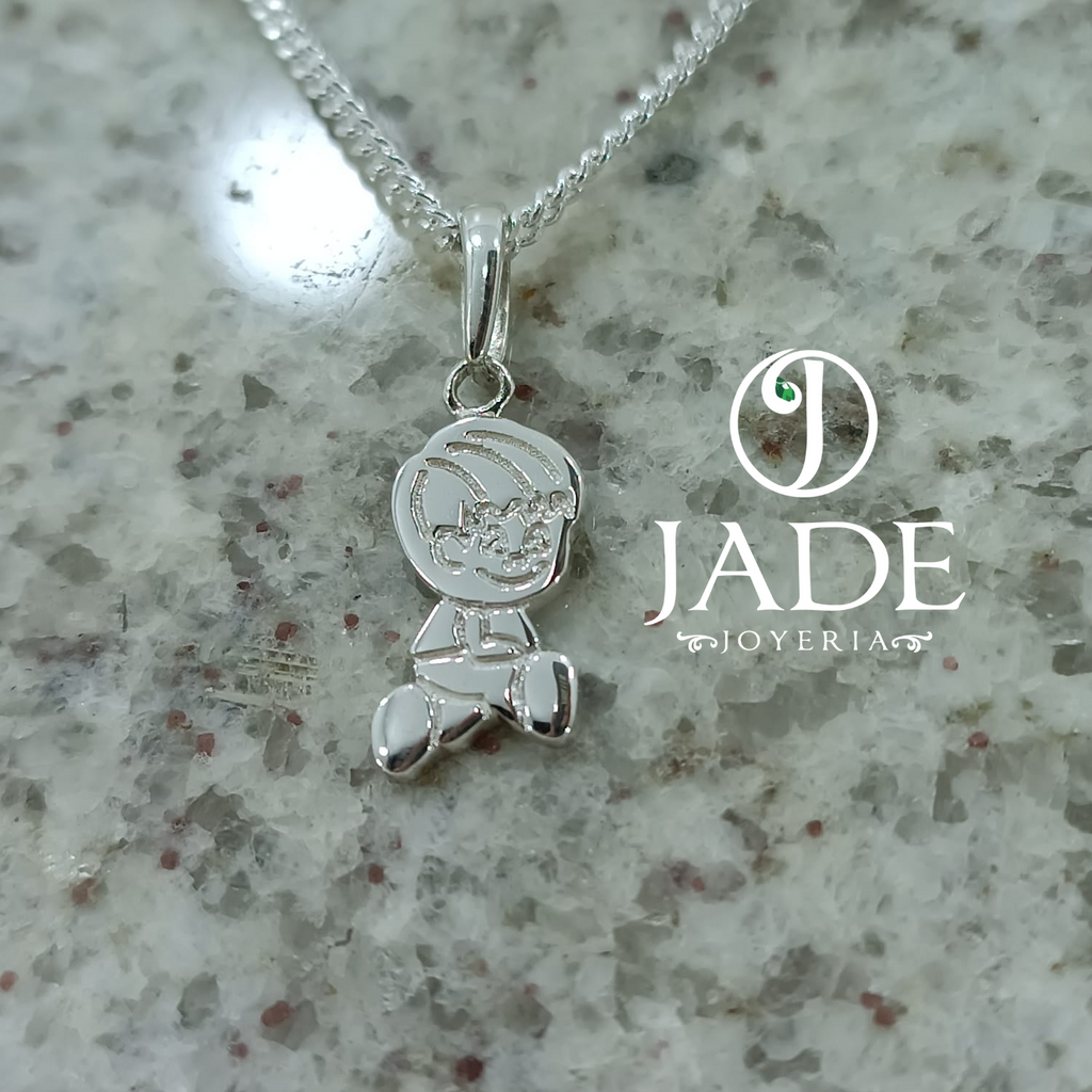 Dije de niño en relieve  plata ley