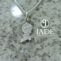 Dije de niño en relieve  plata ley