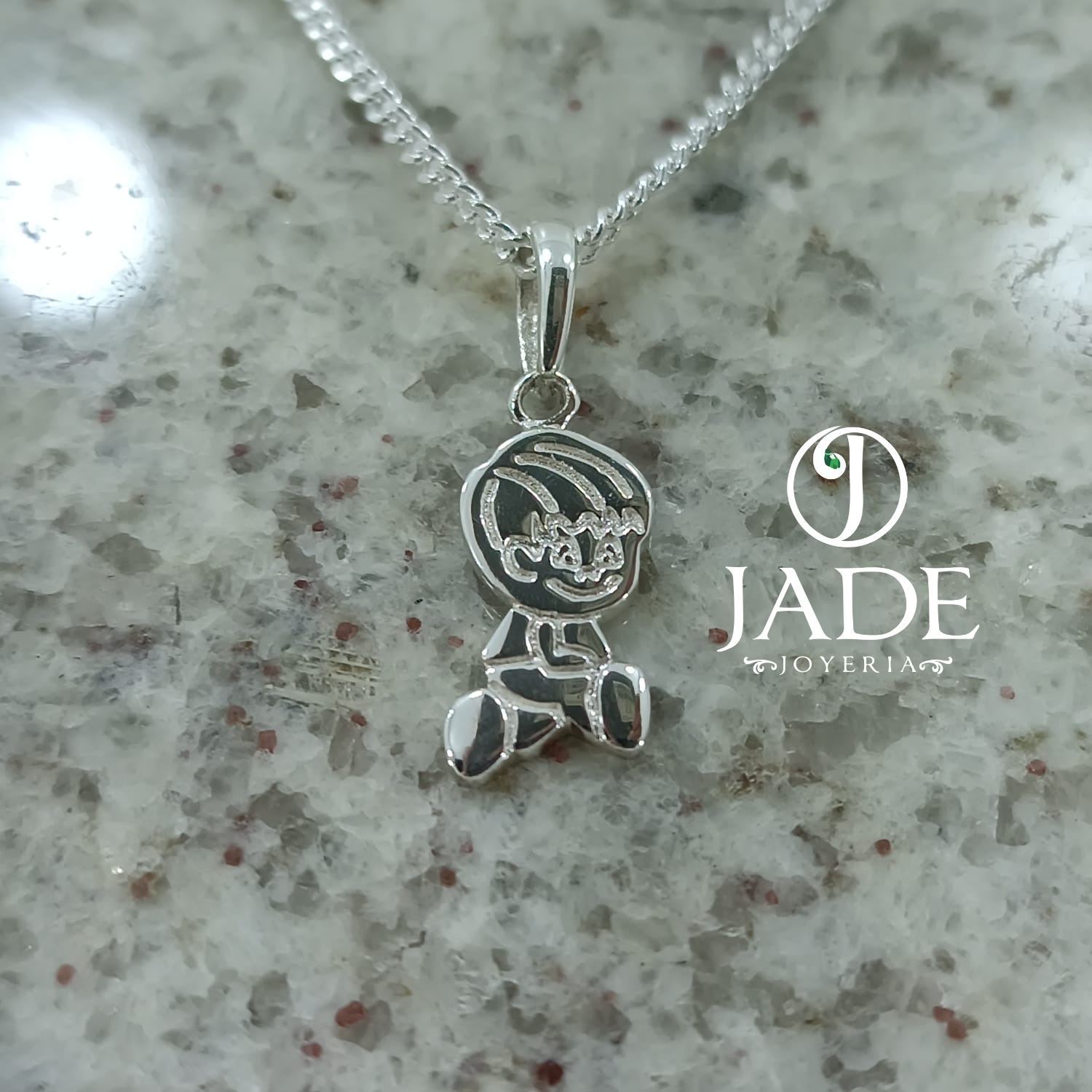 Dije de niño en relieve  plata ley