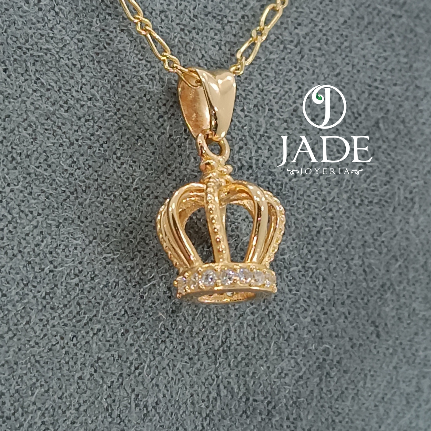 Dije de Corona en oro 18k