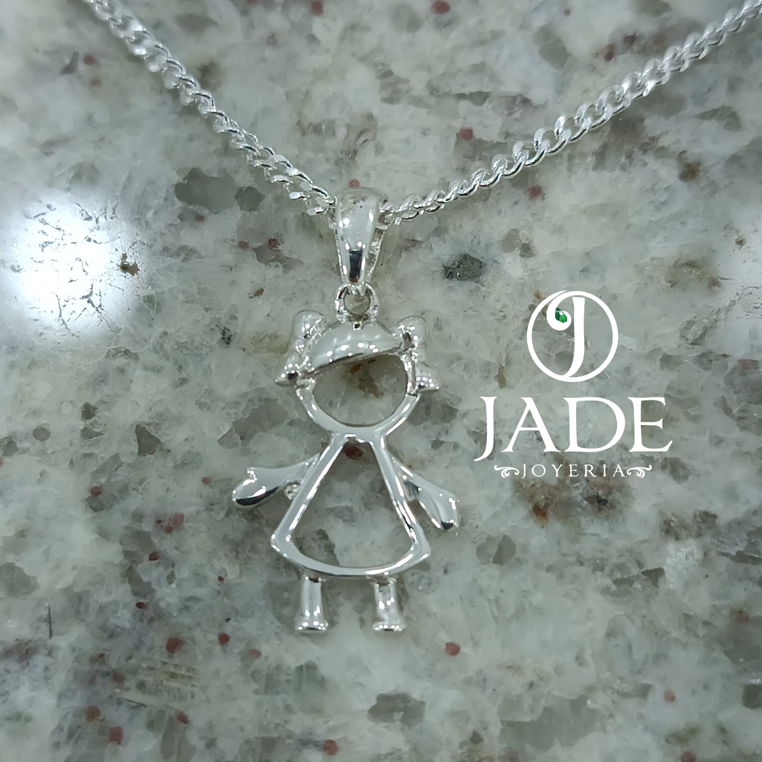 Dije silueta de niña en plata ley