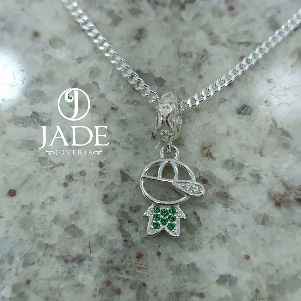 Dije niño tipo charm en plata ley