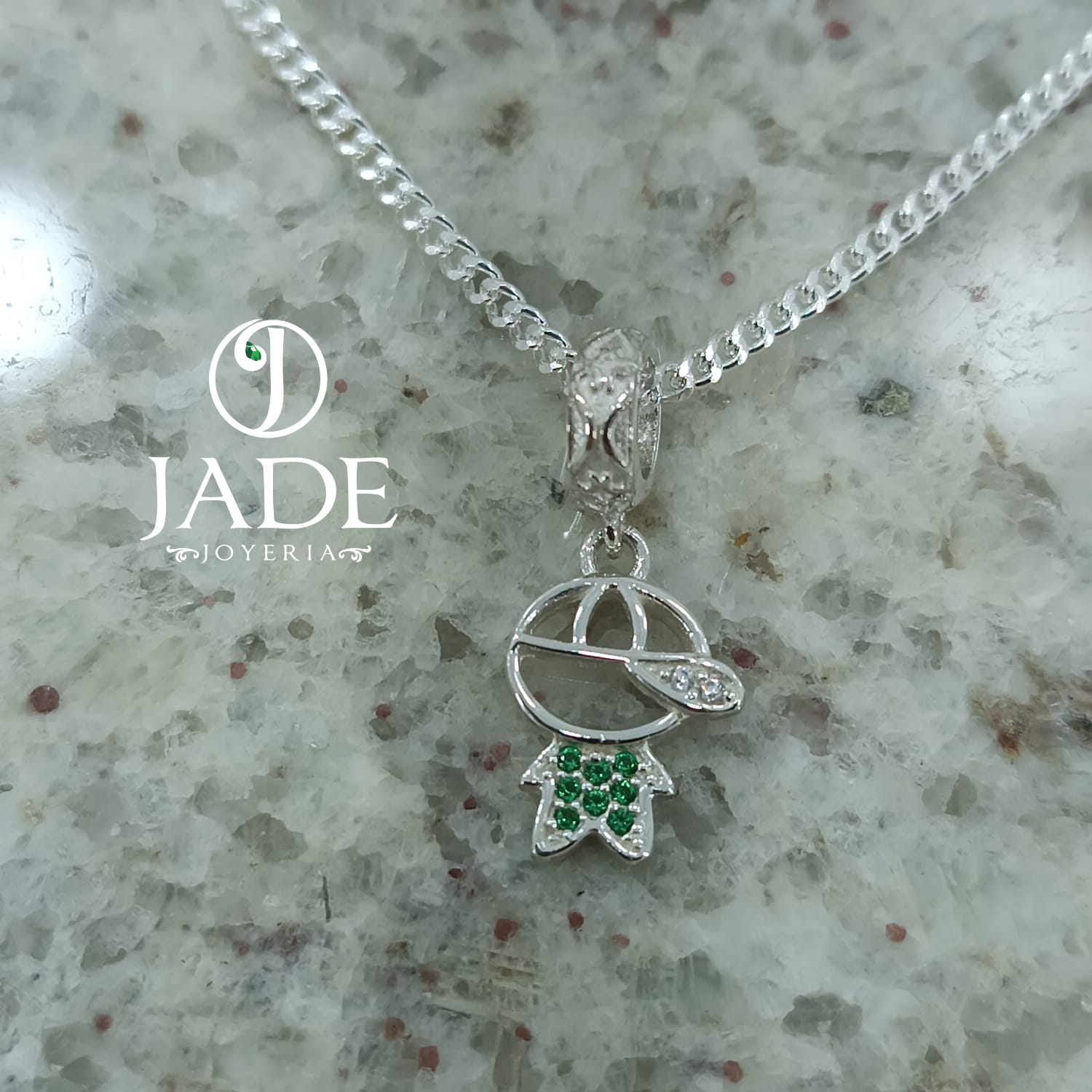 Dije niño tipo charm en plata ley