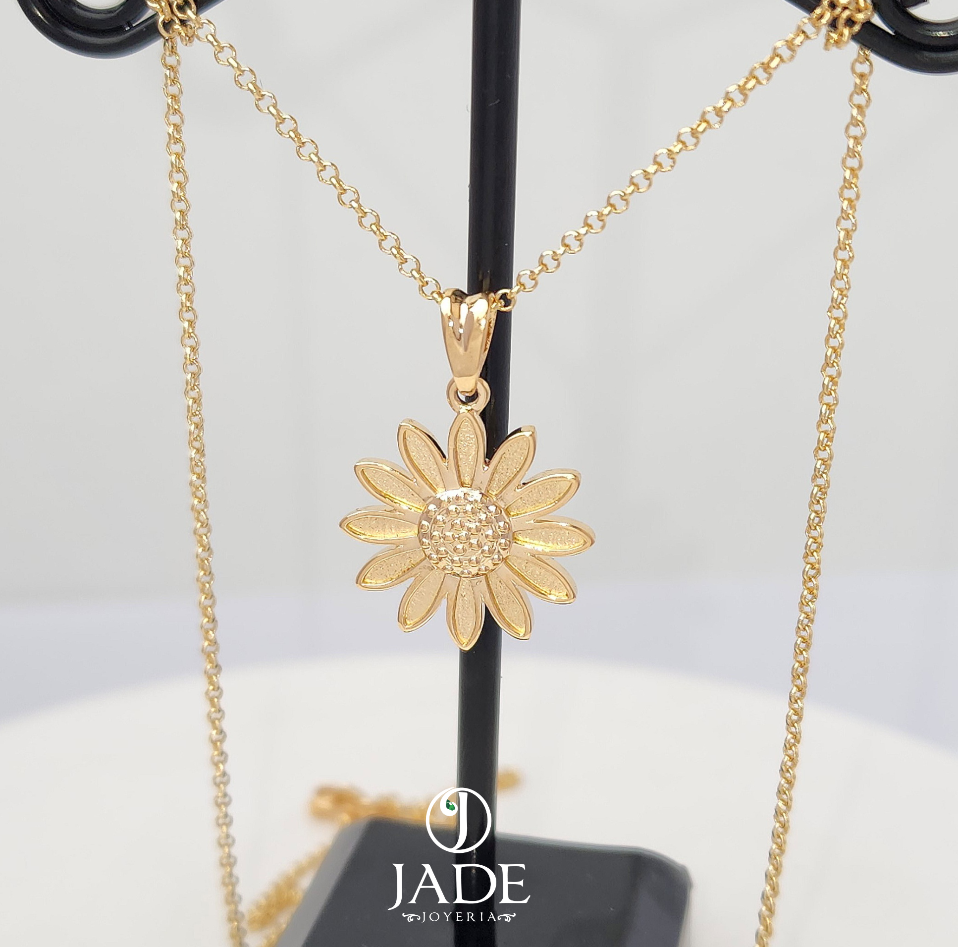 Dije de girasol