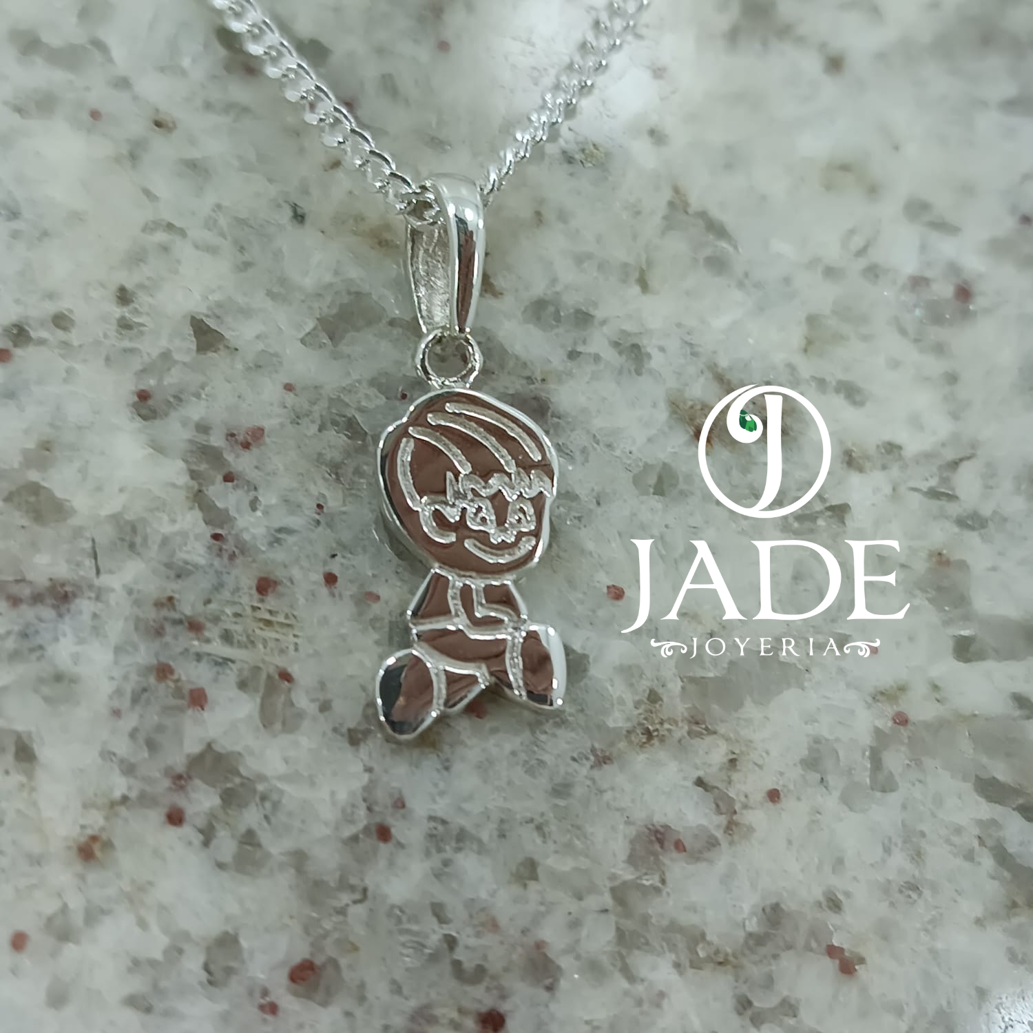 Dije de niño en relieve  plata ley