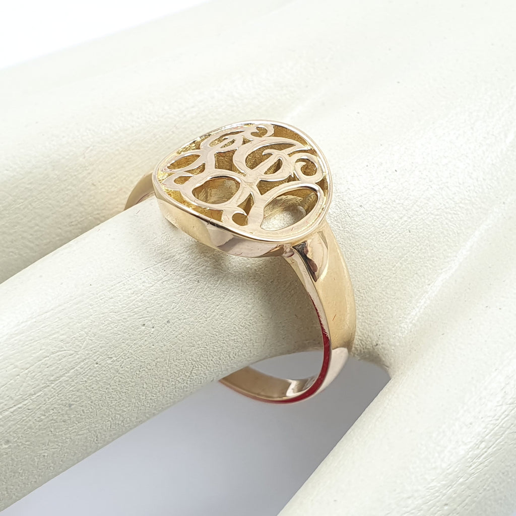 Anillo Letras Entrelazadas Oro de 18k
