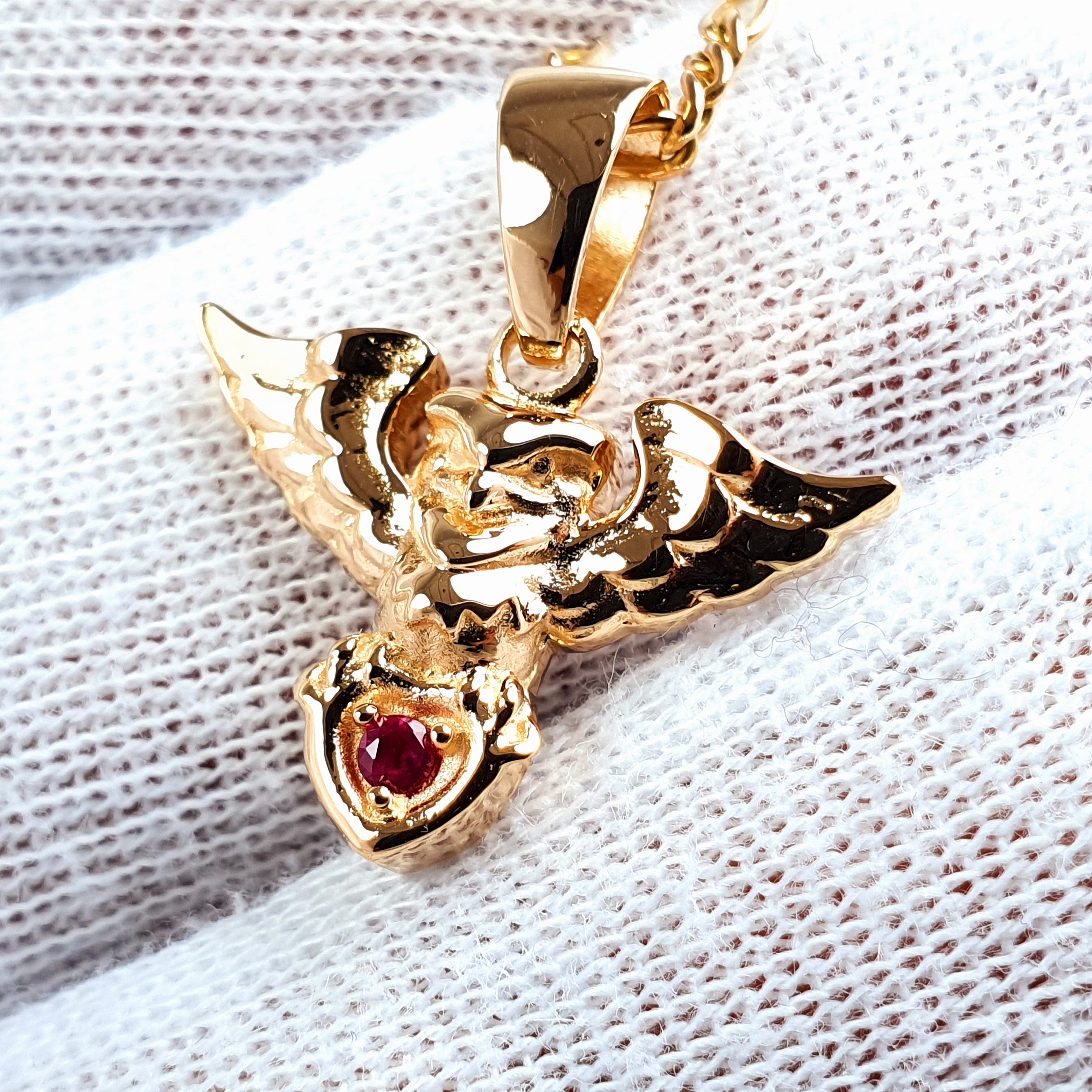 Búho dije en oro 18k con piedra circón