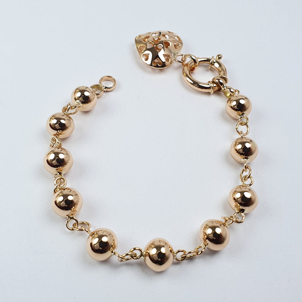 Pulsera de Bolitas con Dije de Corazón