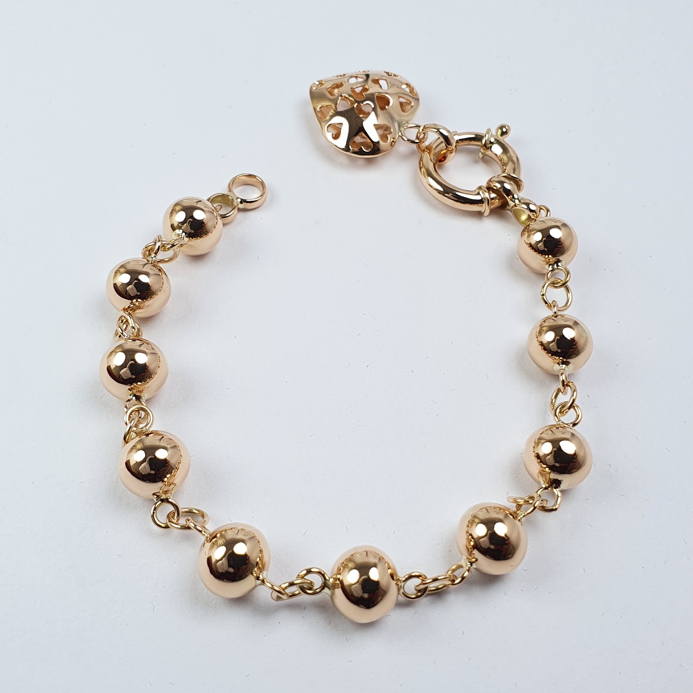 Pulsera de Bolitas con Dije de Corazón