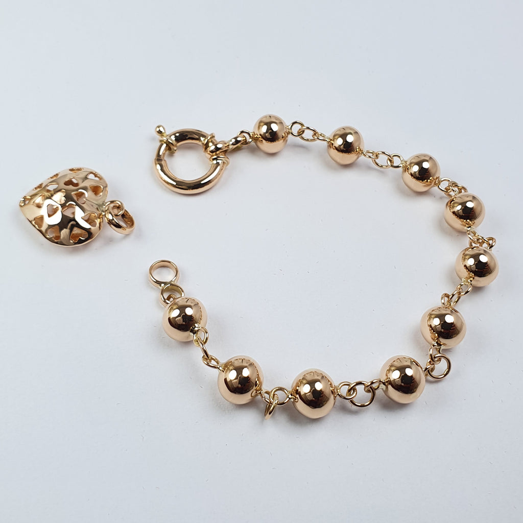 Pulsera de Bolitas con Dije de Corazón