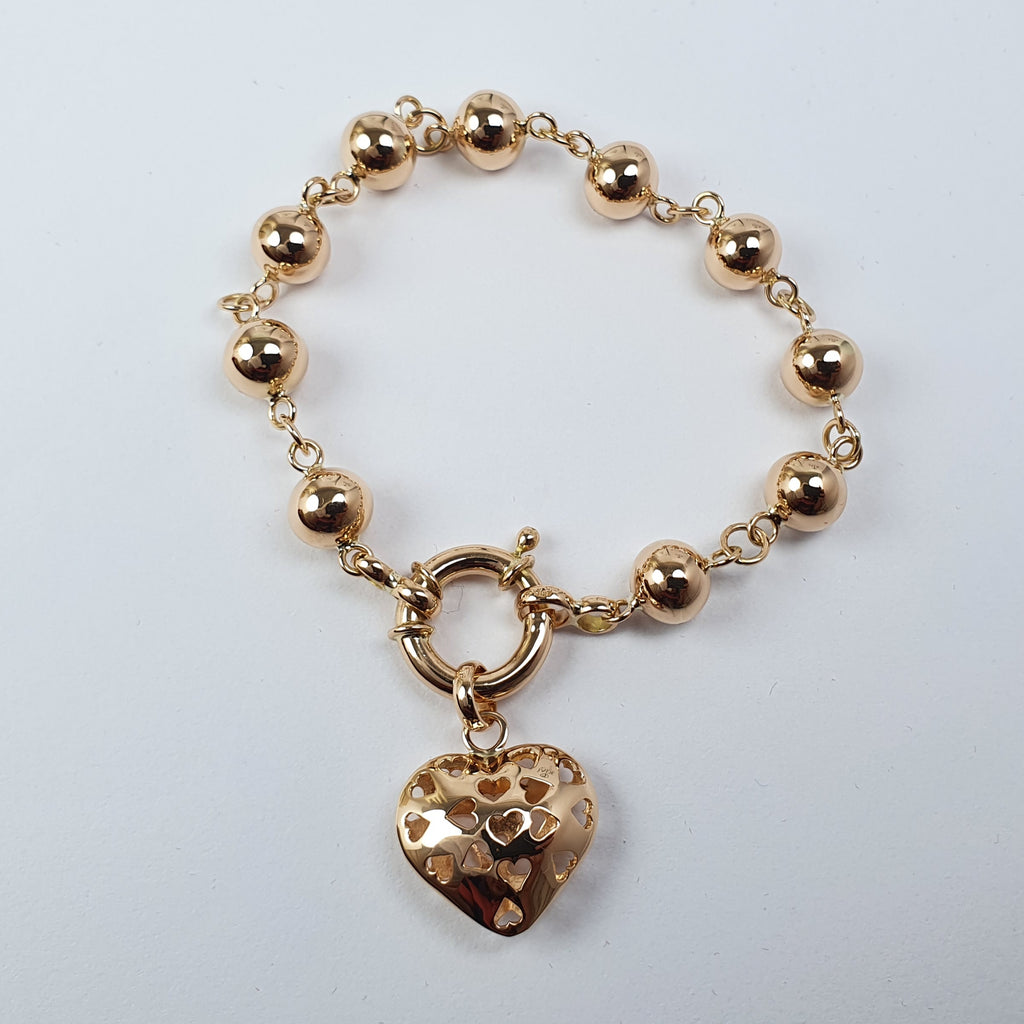 Pulsera de Bolitas con Dije de Corazón