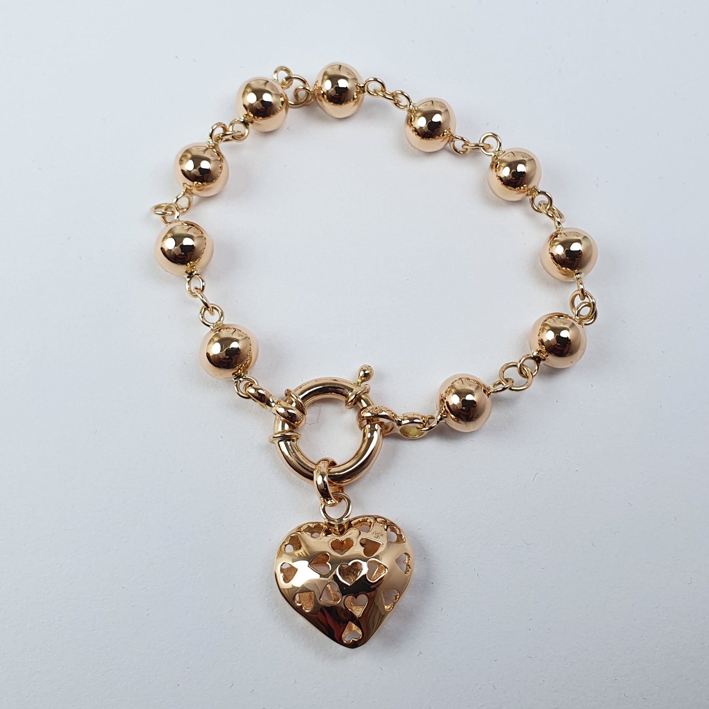 Pulsera de Bolitas con Dije de Corazón