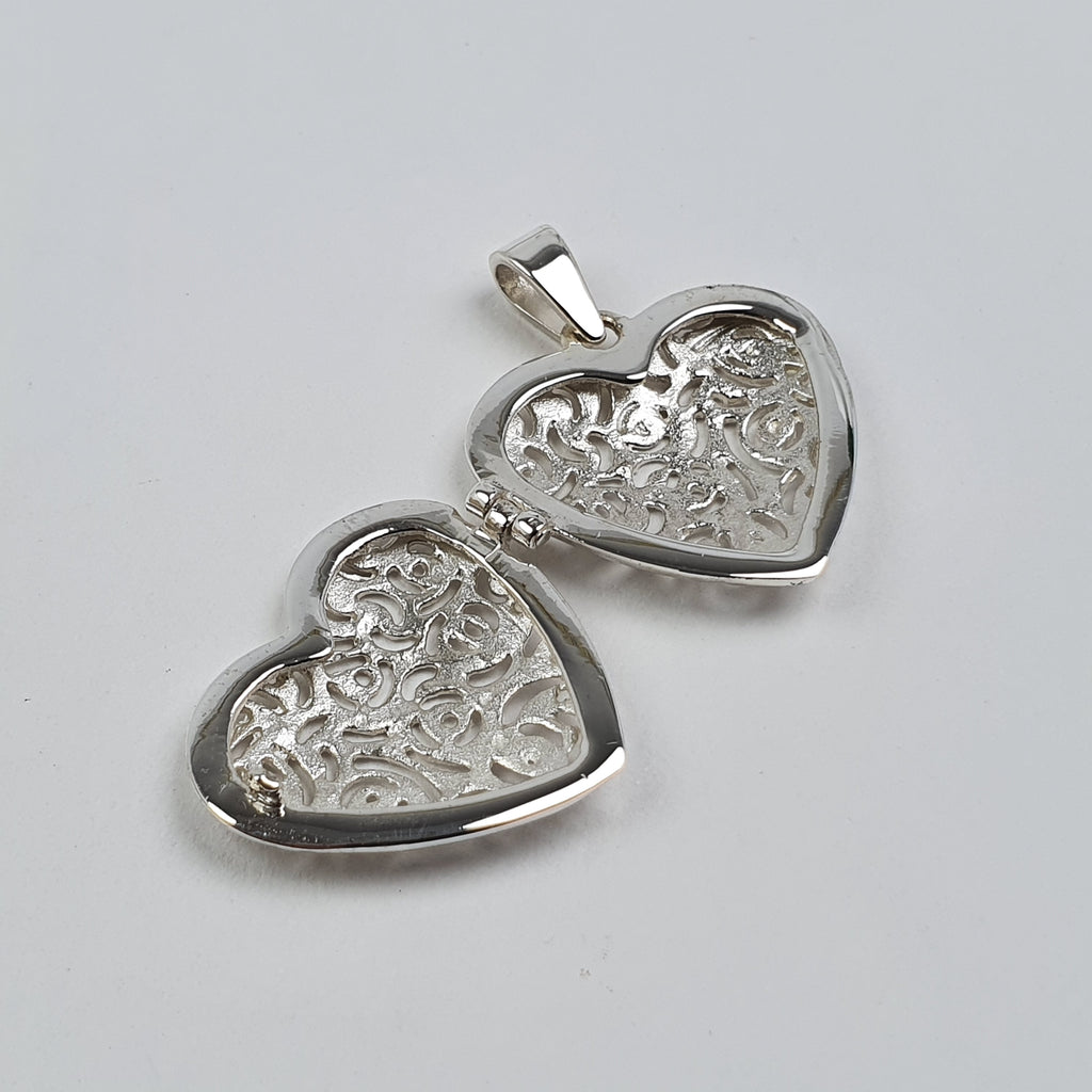 Dije relicario guardapelo portafoto en plata