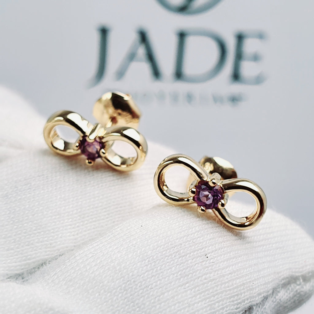 Aretes infinito con piedra central