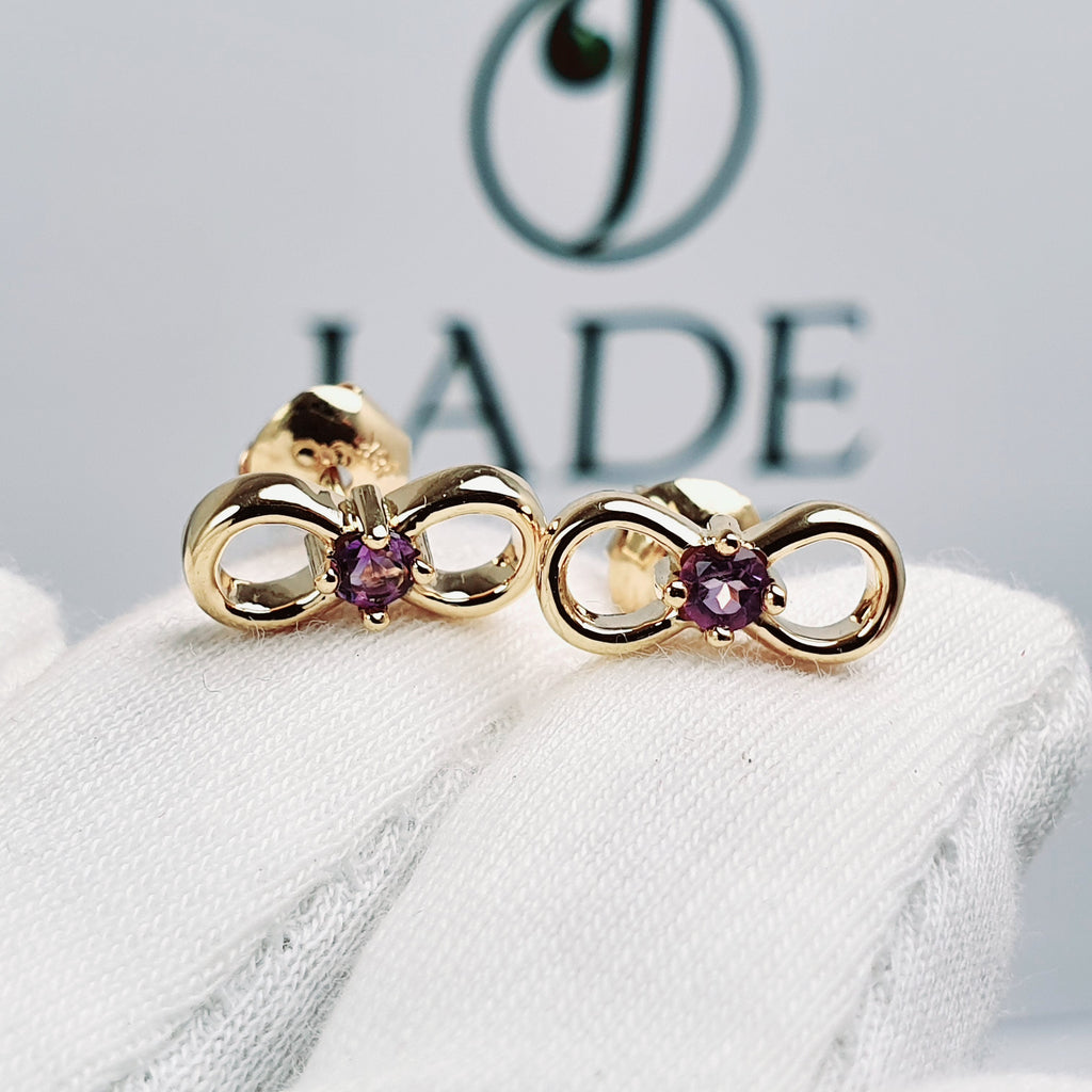Aretes infinito con piedra central