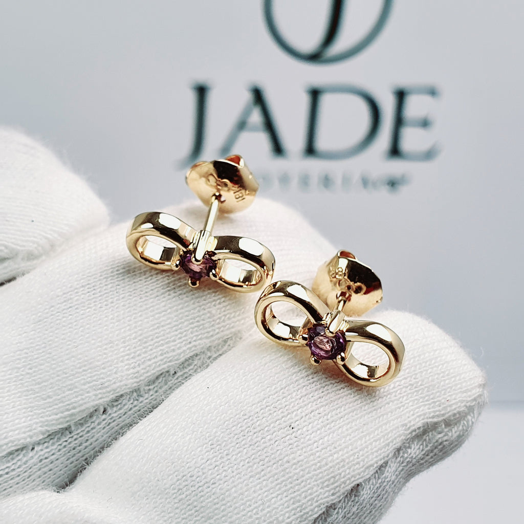 Aretes infinito con piedra central