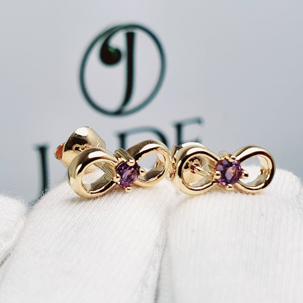 Aretes infinito con piedra central