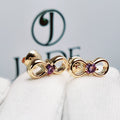 Aretes infinito con piedra central